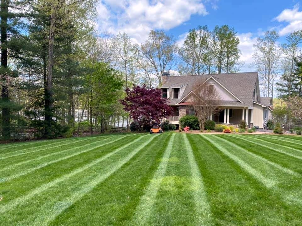 House with manicured lawn and trees